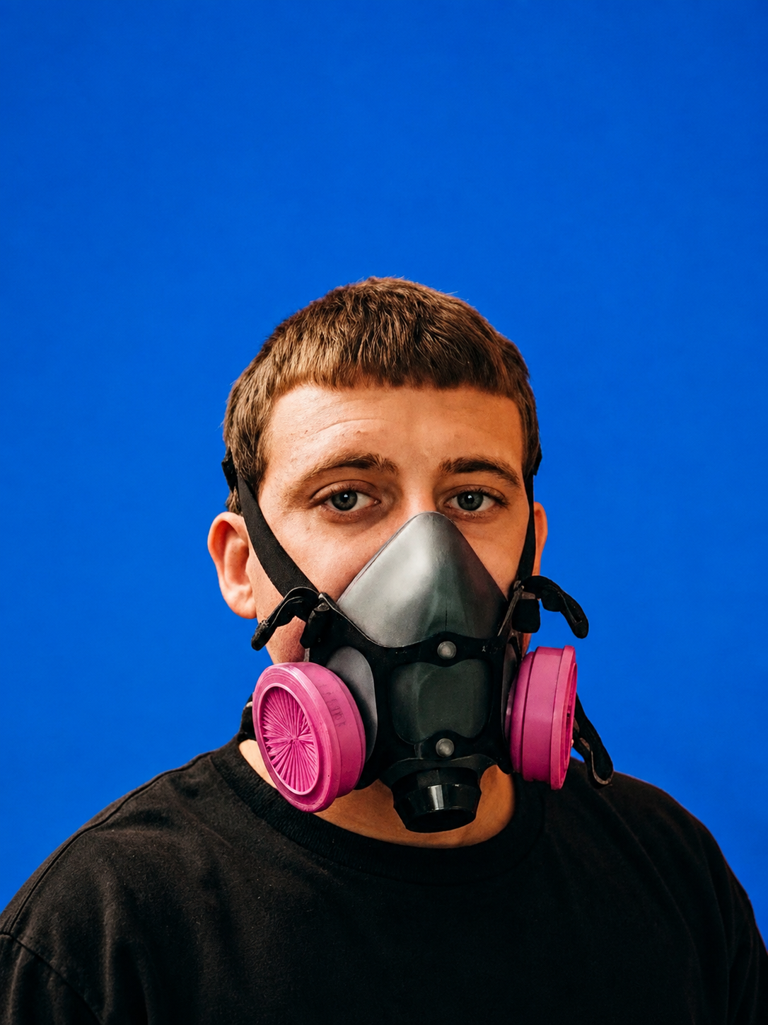 Peak Bio-Clean technician in a protective respirator